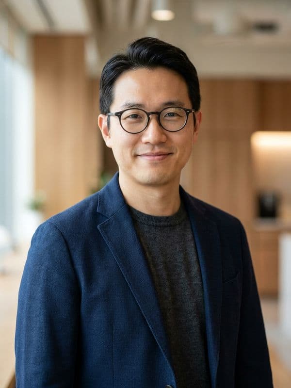 AI-generated example of a Business Casual headshot: blazer with a softly blurred office behind